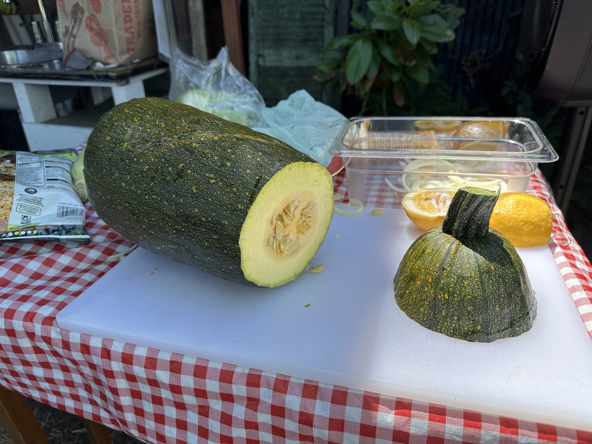 A cut squash on a checkered table